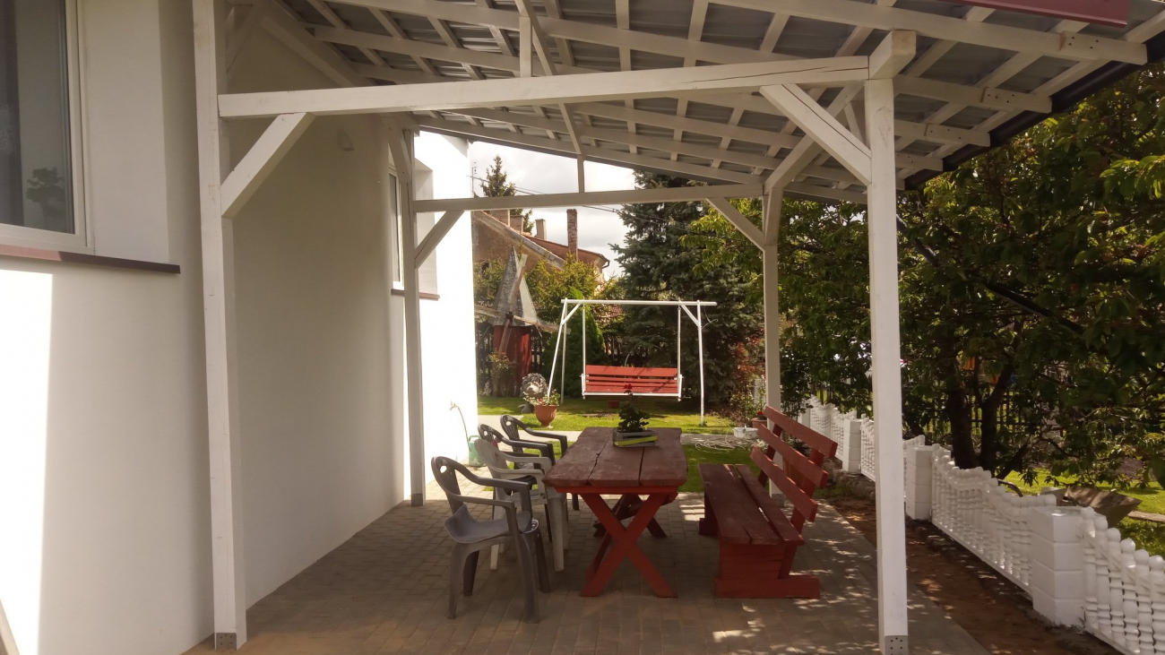 Wykonanie drewnianej altany oraz prace brukarskie przy budynku. 3